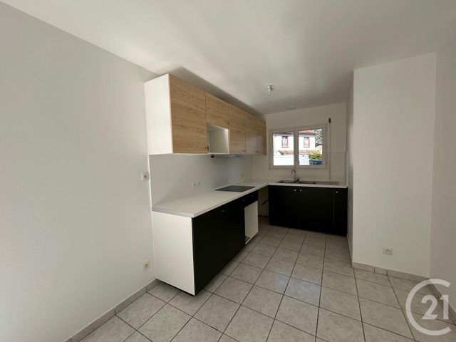 Appartement T3 à louer - 3 pièces - 64.24 m2 - LE BOUSCAT - 33 - AQUITAINE - Century 21 Cabinet Rollin