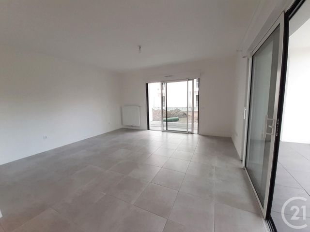 Appartement T2 à louer - 2 pièces - 52.43 m2 - LE BOUSCAT - 33 - AQUITAINE - Century 21 Cabinet Rollin